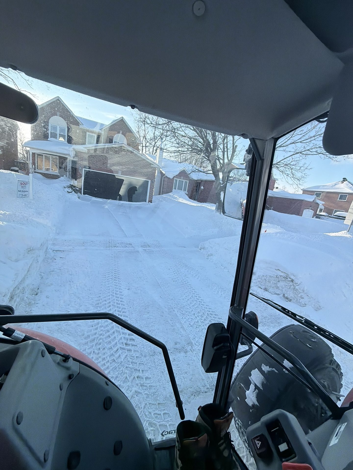 Snowforce heavy-duty equipment clearing a Barrie driveway